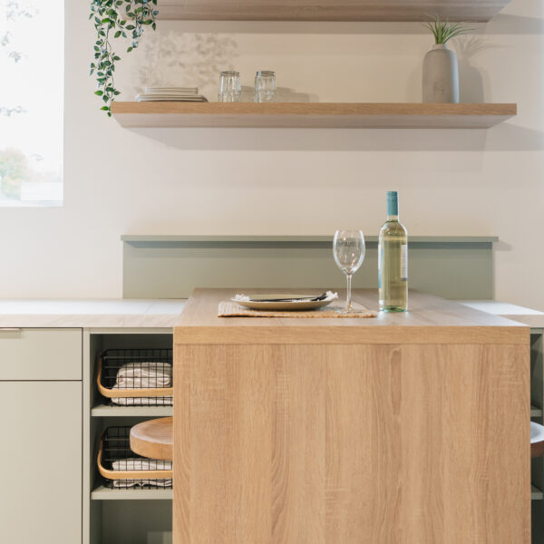 Brown and light green kitchen