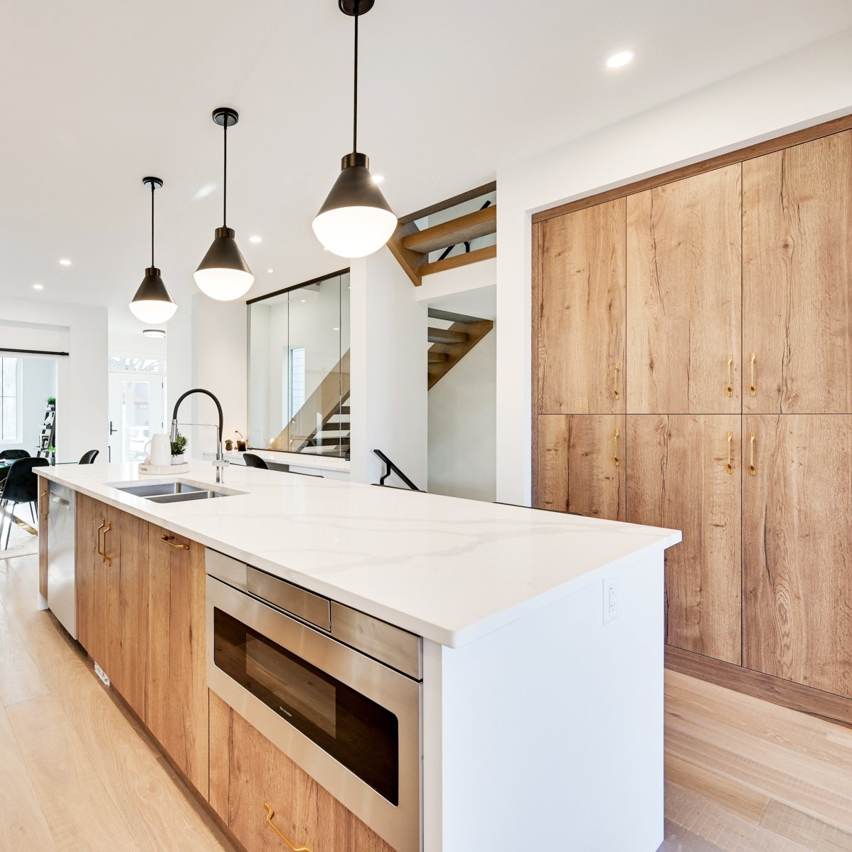 White kitchen with Tobacco Halifax Oak Material accents