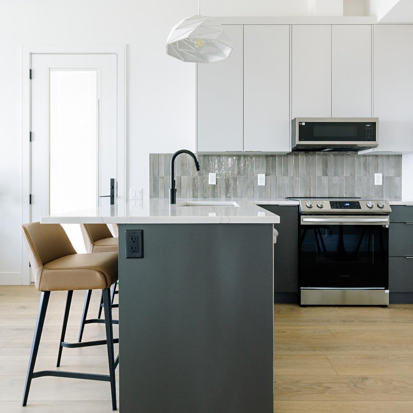 Light Sunset grey material colour kitchen with dark elements